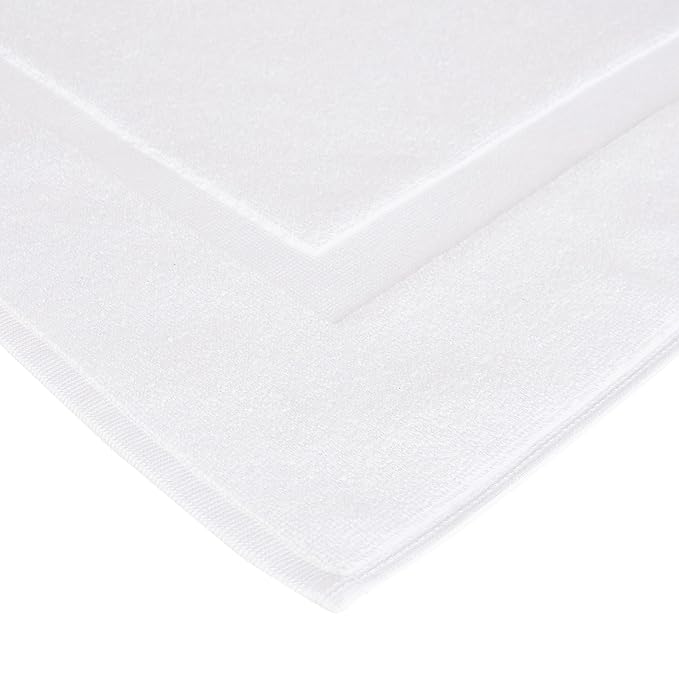 Amazon Basics Non-Slip Cotton Bath Mat, 100% Cotton Absorbent, Machine Washable, 31" L x 20" W, Bright White
