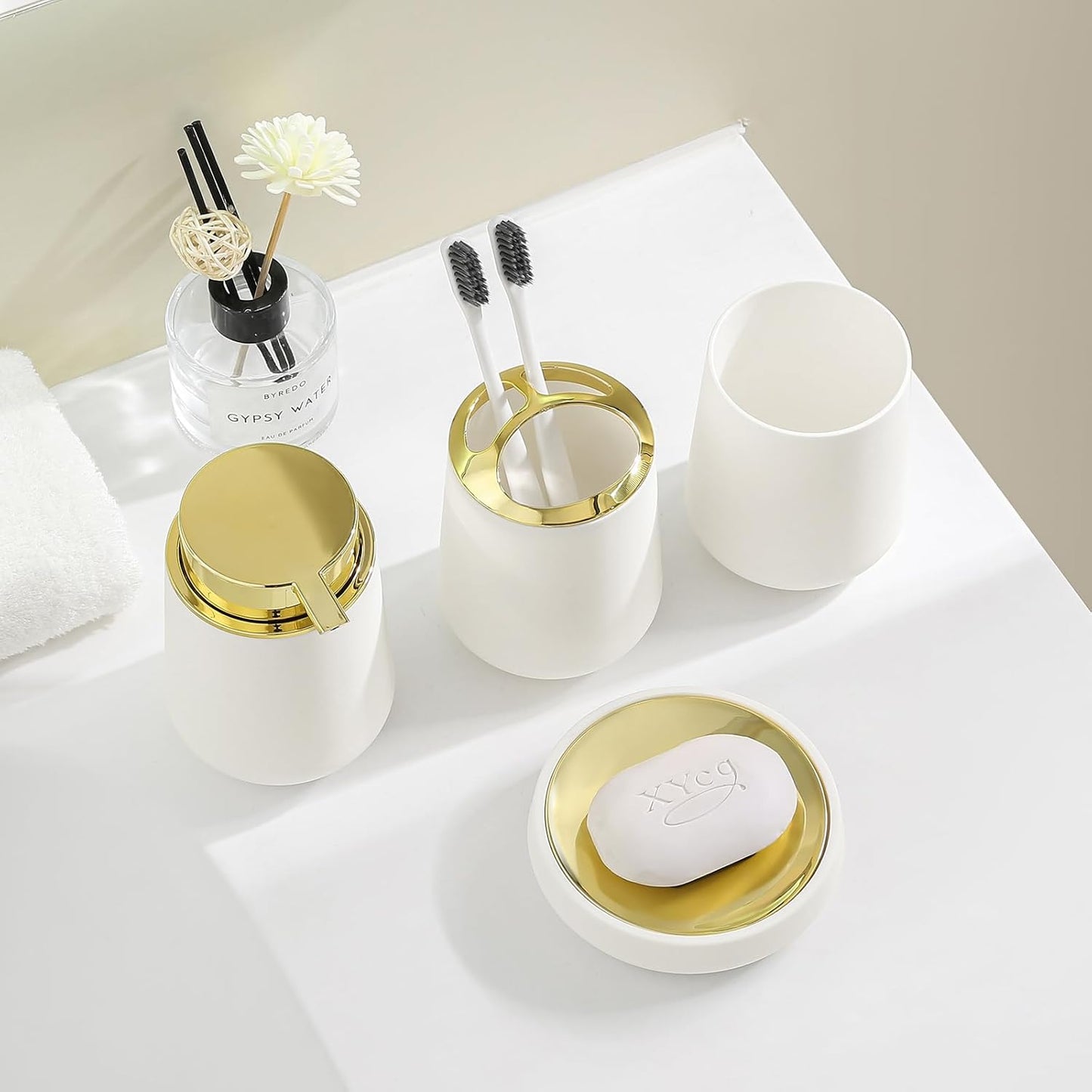 White and Gold Bathroom Accessories 4 Piece Set Luxury Matte Plastic Soap Dispenser Toothbrush Holder Cup Soap Dish for Modern Bathroom Deco
