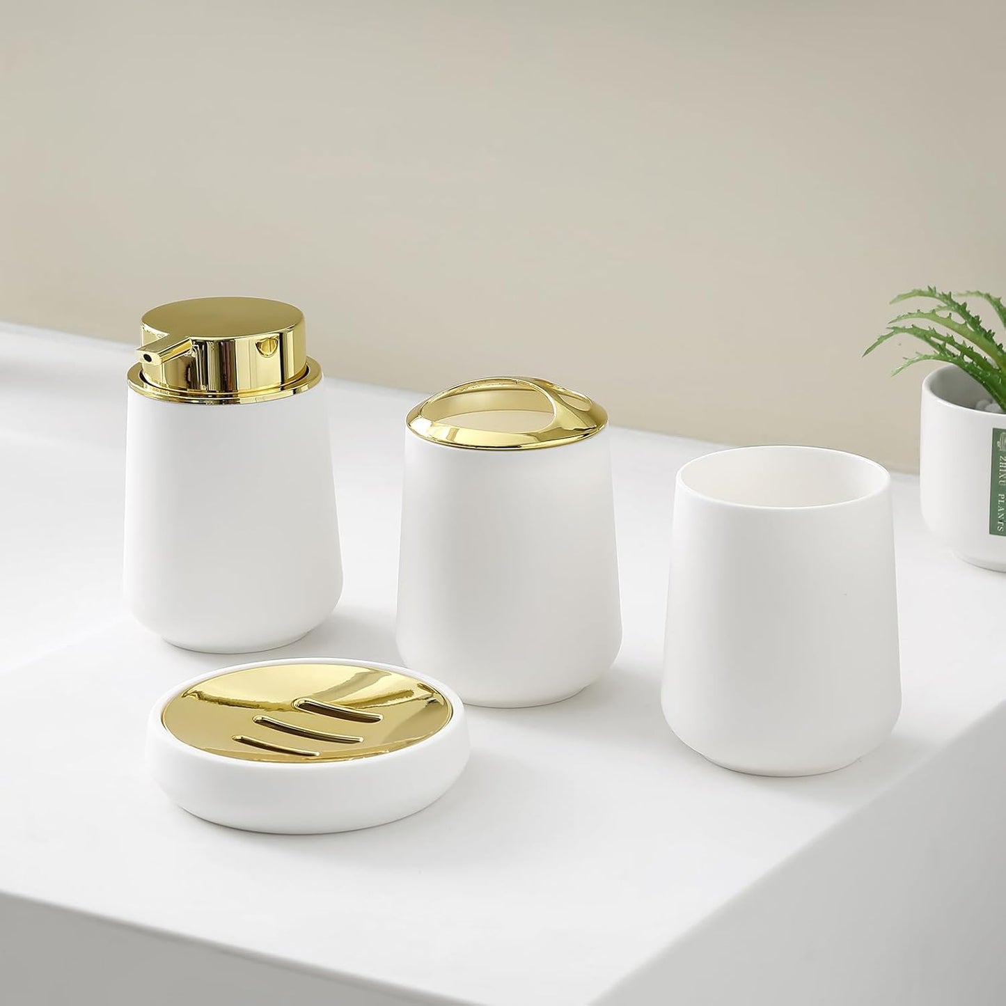 White and Gold Bathroom Accessories 4 Piece Set Luxury Matte Plastic Soap Dispenser Toothbrush Holder Cup Soap Dish for Modern Bathroom Deco