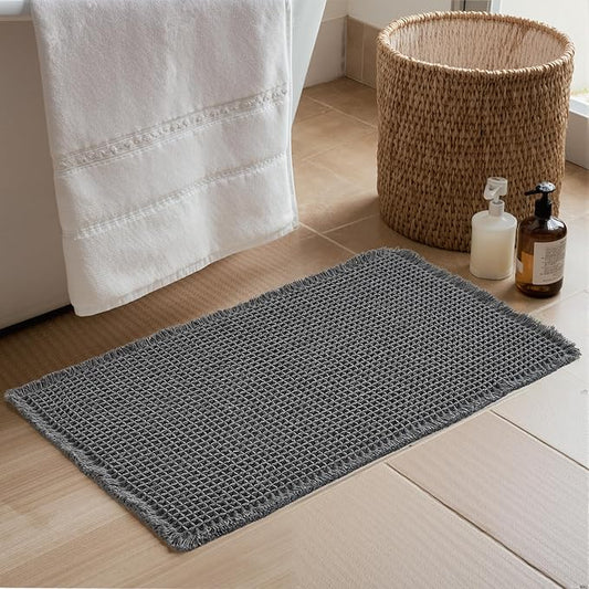 KGORGE Waffle Bath Mat, Super Absorbent 17" X 24" Farmhouse Ultra Soft Bathroom Rugs with Tassels for Bathroom Decor, Boho Non Slip Rubber Backed Shower Mats for Floor Bathtubs, Grey, 1pc